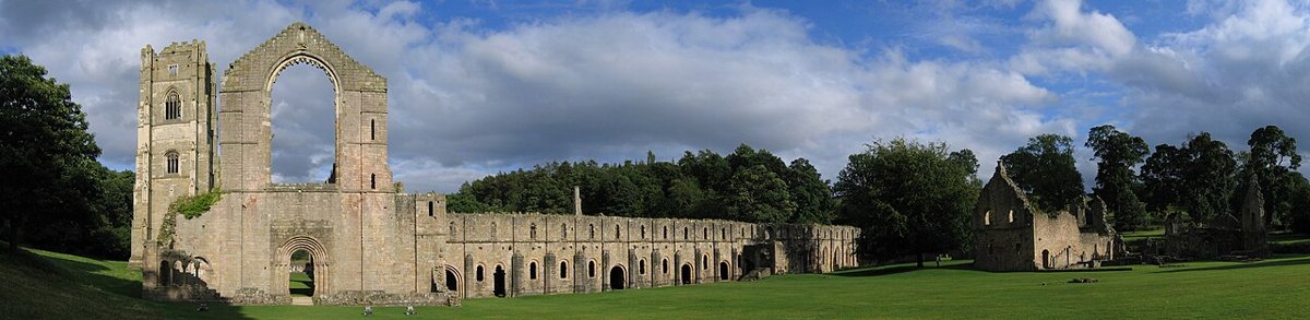 The long medieval stone ruins of Fountains Abbey