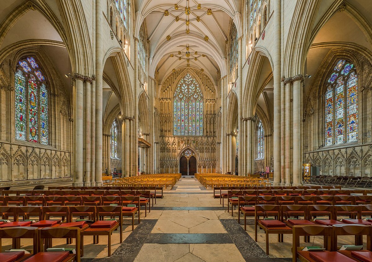 The vaulted nave and stained-glass windows inside York Minster